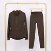 Conjunto de jaqueta com gola alta e calça cropped da marca LULU DF, em estoque, entrega direta, justo, respirável, elástico, com zíper dourado