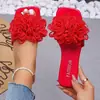 Sandalias de comercio exterior 2025 primavera/verano nuevo modelo Zapatos de playa europeos y americanos Chanclas planas florales casuales para exteriores para mujer en tallas grandes