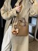 Bolsa Texturizada Feminina 2025 Verão Moderna Retrô Casual Bolsa de Ombro Transversal para Trabalho Bolsa Balde