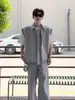 Fabricante directo chaleco de cuadros estilo americano de dos piezas falsas para hombres y mujeres, camisa de cuadros sin mangas de verano, chaleco cárdigan estilo coreano