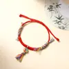 Pulseira de Reencarnação Sete Cores Estilo Xizang com Fio Vermelho Colorido para o Festival do Barco-Dragão, Fio de Corda para Thangka Artesanal, Venda por Atacado de Fio de Tecelagem Feito à Mão