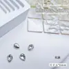 Venta al por mayor de joyas para uñas, transparentes, grandes diamantes con punta inferior, Super Flash, hacha torcida, gotas de agua, mariposa cuadrada gorda, accesorios para uñas de diamante blanco