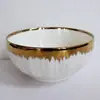 Cuenco y Plato de Cerámica con Borde Dorado Electroplateado y Diseño en Relieve