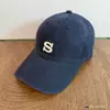 Gorra de béisbol versátil estilo coreano con bordado de la letra S, sombrero de sol unisex para el día a día, simple y favorecedor para el rostro
