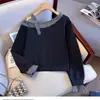 Moletom com Design de Retalhos Xadrez e Ombro Assimétrico para Mulheres Primavera e Outono Novo Estilo Coreano Manga Longa Off-Shoulder Solto Curto Pulôver