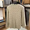 Suéter casual de punto trenzado gris para hombre, estilo pullover, nuevo diseño de otoño e invierno, top base de punto de ajuste holgado