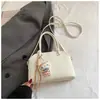 Novidades da Primavera de 2026 Bolsa Feminina de Grande Capacidade Estilo Retrô Nicho Bolsa Transversal de Ombro Elegante para o Trabalho e o Dia a Dia