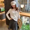 Toma real: Estilo casual de vacaciones, ligero, ligeramente transparente, cárdigan de punto de lana con protección solar para mujer, nuevo modelo 2026, top de corte holgado