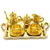 Casa de muñecas transfronteriza mini juego de té de aleación con patrón de ocho piezas cocina en miniatura simulación traje dorado tiro