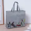 Bolso de mano de tela no tejida de alta gama de moda para llevar ropa, bolsa de regalo grande para compras para tiendas de ropa, en stock