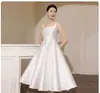 Vestido Negro para Mujer 2026 Nuevo Estilo Francés Hepburn Adelgazante Satín Dobladillo Amplio Tirantes Cumpleaños Vestido Mini