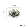 Fabricante Personalizado Ojo del Diablo Retro Personalizado Forma de Ojo Incrustaciones de Diamante Joyería de Alta Gama Accesorios para Ropa Broche