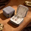 Caja de joyería portátil directa de fábrica con espejo, caja de joyería de lujo de alta gama, caja de almacenamiento de pulsera de cristal, collar, pendientes al por mayor
