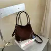 Bolso cubeta retro de nicho 2026 principios de otoño nuevo bolso de mano estampado de leopardo bolso de hombro mate bolso bandolera de gamuza para mujer