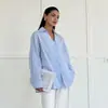 Camisa de Algodão Estilo Francês Feminina 2025 Primavera Nova Cor Sólida Gola Lapela Manga Longa Design de Nicho Senso de Design Camisa Cruzada com Cadarço