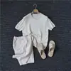 Camiseta masculina de tricô com blocos de cor, tecida, de manga curta, luxuosa e estilosa, solta e versátil para o verão, com gola redonda na cor tendência damasco