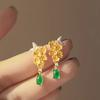Pendientes de gota de agua con flor de metal retro chino de Osmanthus Honey Super Fairy, ligeros, de lujo, de alta gama, elegantes y de nicho.