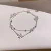Pulsera con cierre de pinza y colgante ovalado de circonita, lujo ligero, alta gama, pulsera exquisita, diseño de nicho, accesorio versátil para mujer