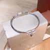 Pulsera de Campana de Lazo de Cobre Blanco Plateado para Mujer Sello de Acero S999 Diseño Nicho Gama Alta Pulsera de Princesa Joven