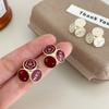 Otoño e Invierno Ancora Rojo Geométrico Círculo Pequeños Aretes Flor Chanel Aguja de Plata para Mujer Moda Retro Francesa Exquisitos Aretes