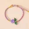 2026 Nuevo Modelo Pulsera de Flor Rosa Iridiscente Ajustable Moda Versátil Cuerda Trenzada Multicolor Cuerda de Seguridad para Pulsera