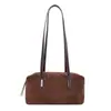 Bolso de axila nuevo de piel de vaca mate para principios de otoño, bolso HOBO almohada retro minimalista, bolso baguette casual para el día a día de textura suave