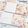 Bonito bloc de notas cuadrado con páginas coloridas, alto valor estético, conveniente para que los estudiantes tomen notas, adecuado para comercio exterior