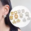 Aretes de Perla Flor Tallada Sombra Micro-incrustación Zirconia Flor Perla Clavo Aretes Vacío Ajuste Nicho Sensación de Alta Gama Nuevos Ornamentos de Oreja Retro Chinos
