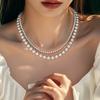 Collar de perlas de doble capa para mujer, nicho, diseño de lujo ligero, cadena para la clavícula de temperamento de alta gama, cadena para suéter, venta directa de fábrica