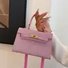 2025 Nuevo Bolso Kelly de Moda Estilo Ins Chica Viajera Versión Coreana Bolso de Hombro Bolso de Mano Versátil a la Moda Bolso Cruzado
