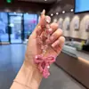 Chaveiro de argila com laço cravejado de strass, pingente de corrente com contas de cristal da moda, acessório de bolsa para menina doce e descolada, corrente para pendurar no celular