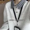 Sudadera retro americana a cuadros con cuello polo 2026, unisex, corte holgado, estilo universitario, look en capas, camiseta de manga larga, moderna para otoño