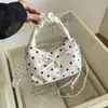 Bolso dulce de moda transfronterizo tipo bolsa de albóndiga para mujer 2026 nuevo de verano con lunares y cadena bolso de un solo hombro bolso cruzado para ir al trabajo