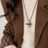 Collar colgante de lágrima de piedra ojo de tigre vintage para mujer, nuevo estilo 2026, cadena para suéter única y elegante, accesorio de diseño nicho
