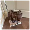 Bolso de cadena casual de moda con patrón de diamantes para mujer, nuevo 2026 bolso vintage de alto valor para el día a día, bolso de hombro y cruzado de nicho