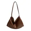 Bolso cubo de moda estilo coreano transfronterizo para mujer, nuevo modelo verano 2026, bolso de hombro simple de color liso, bolso cruzado para el día a día