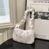 Bolso de axila para mujer transfronterizo 2026 nuevo estilo japonés dulce y hermoso bolso de mano plisado bolso de hombro bolso de mano casual