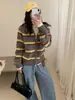 Cardigan de Tricô Listrado Outono/Inverno 2026 Novo Casaco Suéter Engrossado Blusa Solta com Capuz Manga Longa