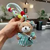 Estilo Coreano Nuevo Perro de Peluche de Pie Lindo Bolso Cruzado Suéter Llavero de Dibujos Animados Colgante de Muñeca Linda Venta al Por Mayor