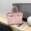 Bolso de Mano de Cuero Genuino con Hebilla Chapada en Oro Platino Patrón Lichi Gran Capacidad Bolso Tipo Kelly para Mujer 2026 Nuevo Bolso de Hombro de Moda Tendencia
