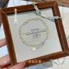 Pulsera Fushi Plata Pura 999.9 con Flor y Mariposa Esmaltadas Pintadas en Oro, Disponible en Múltiples Colores, Nuevo Estilo Chino, Moderna y Versátil