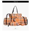 2026 Nueva Bolsa Rayada de Gran Capacidad Set de Múltiples Piezas para Mujer Bolso de Mujer Bolso de Hombro Popular Estampado para Mujer