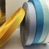 Fita de Nylon Imitação com Padrão de Rede e Cores Vibrantes para Venda por Atacado, Fita de Amarração Brilhante e Resistente à Tensão, Cinta para Bagagem Estilo Americano