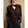 Suéter de punto estilo francés 2026 con diseño de cinta, un nuevo artículo de otoño único y chic, top retro para usar sobre otras prendas, estilo europeo y americano