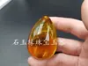 Cera de abeja al por mayor fluorescente flotante agua salada mango de cera de abeja colgante Hu cera de abeja color amarillo aceite de pollo colgante Buda Guanyin cabello de cera de abeja vieja