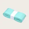 Cinta para mango de bádminton plana absorbente de sudor antideslizante profesional para empuñadura de raqueta cinta para mango de bádminton plana absorbente de sudor antideslizante profesional