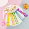 Llavero Colgante de Cordón de Cuero con Letra Transparente Brillante con Accesorios Estilo Muñeca Rellena de Aceite Encanto de Llavero Pulsera Venta al por Mayor