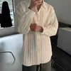 Camisa de manga larga con textura para primavera y otoño para hombre, elegante y moderna camisa de color liso con cuello de solapa, top de moda moderno para hombre