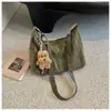 Bolso de mano retro transfronterizo para mujer, nueva colección de otoño 2026, un bolso de hombro súper popular y versátil de gran capacidad, perfecto para ir al trabajo y se puede llevar cruzado.