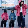 Cortavientos con capucha para niñas de otoño 2026 nuevo estilo chaqueta de primavera y otoño de moda para niños mayores cortavientos tres-prueba para exteriores